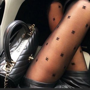 Chanel CC tights in brand new unopened package .